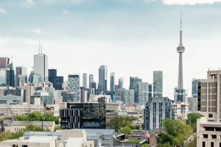 Photo of the Toronto skyline, showing the Rotman Building's close proximity to the financial district and downtown core