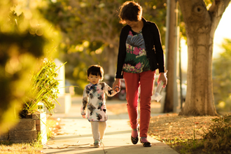 woman walking with child