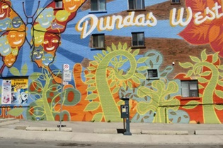Photo of a mural in the Dundas West neighbourhood | Click here to learn more